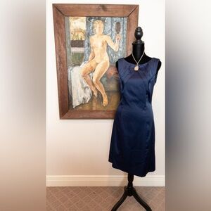 Absolutely stunning satin look navy dress absolutely class at its finest!! NWOT